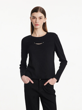 a lady in black round neck slim women knit top with black jeans